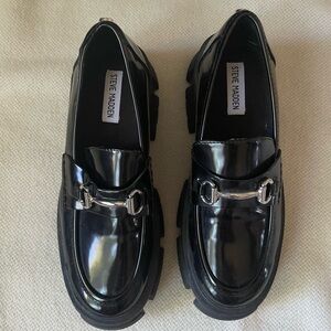 Lando Steve Madden Glossy Black Loafers with Silver Bit Accent